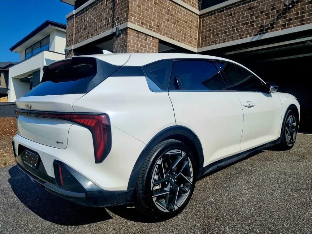 A 2025 Kia GT fitted with superior ceramic window film in a legal shade, delivering incredible heat rejection, UV protection and enhanced driving comfort while maintaining a sleek factory finish.