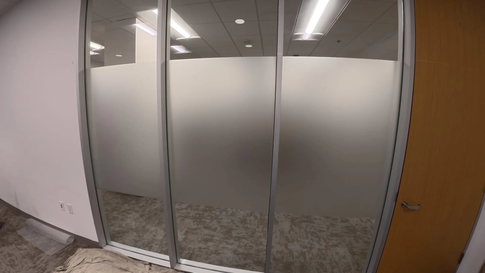 Frosted privacy film on glass office partitions in the Melbourne CBD