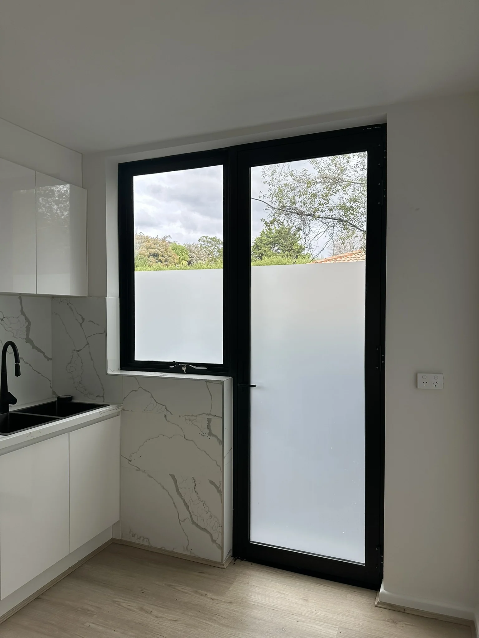 Frosted Film on a Kitchen Door and Sidelight in Kew East
